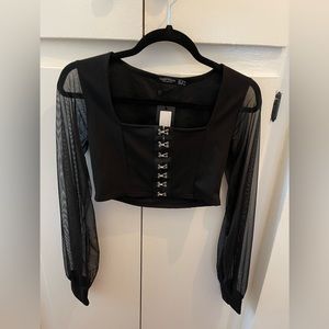 Black corset like top with mesh sleeves